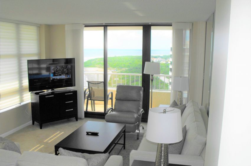 Living room with view of beach